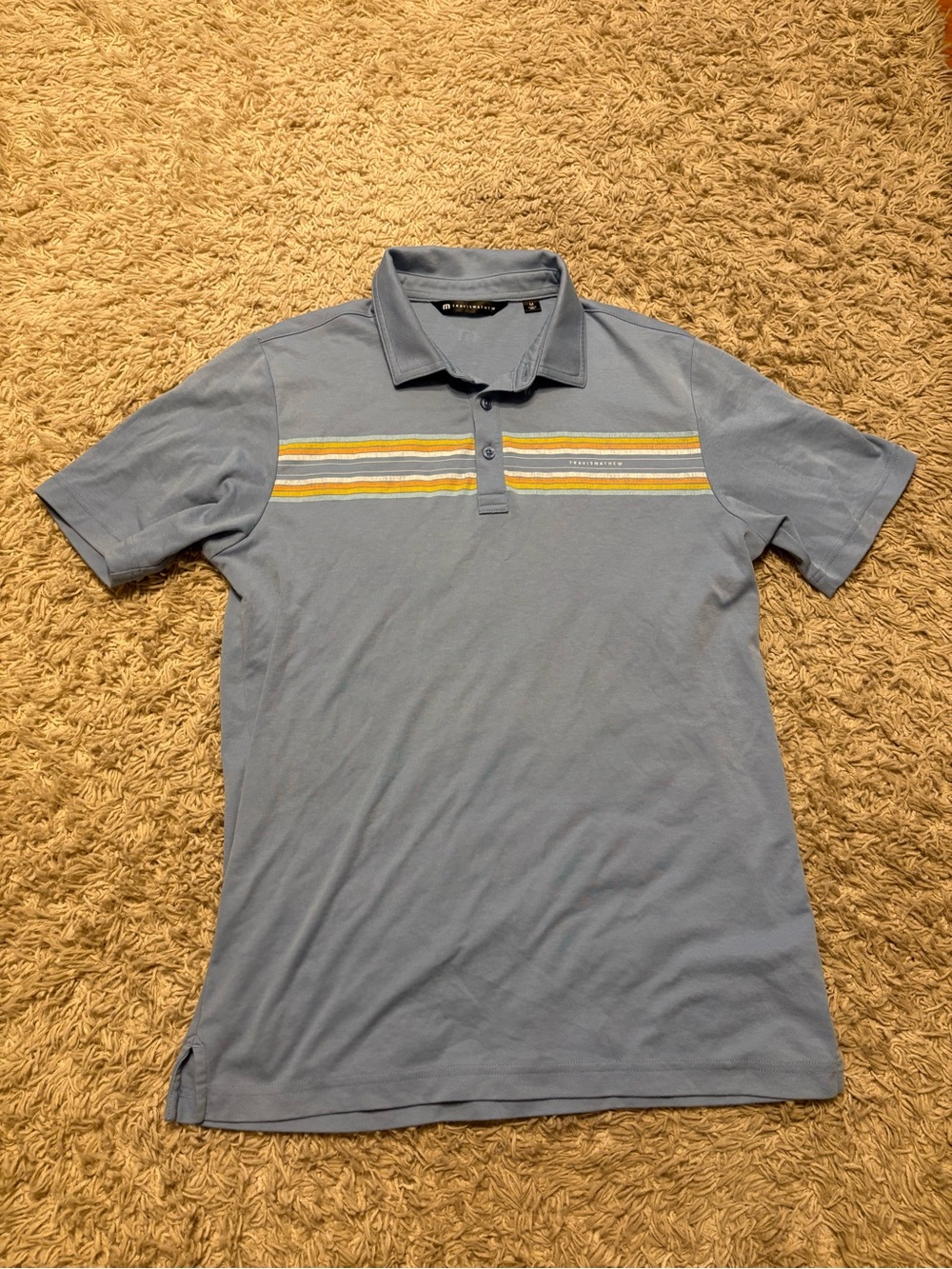Travis Mathew Light Blue Polo with Yellow Stripe Detail